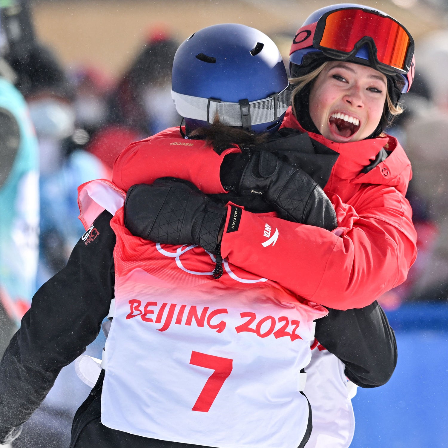 Chinese-American skier Eileen Gu (right) hugs winner Switzerland’s Mathilde Gremaud after the freeski slopestyle event at this year’s Winter Olympics.