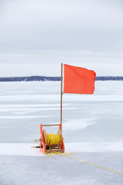 A flag and a yellow rope indicate the starting and finishing line at the 2021 IDNYIRA Nationals.