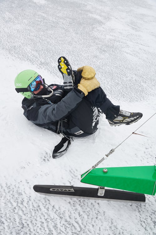 An Iceboat racer stretches before a race at the 2021 IDNYIRA Nationals.
