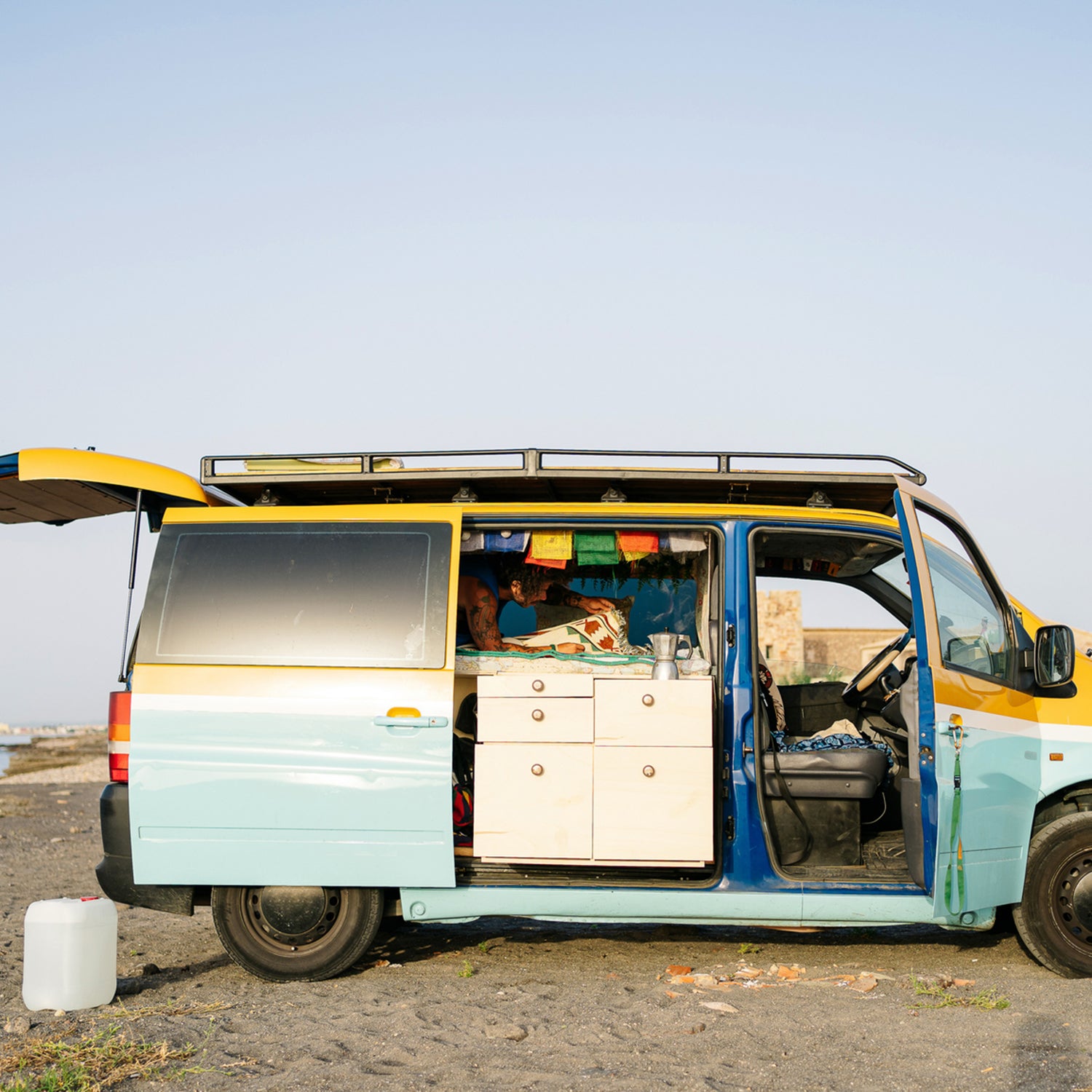 Resting in a van on the beach