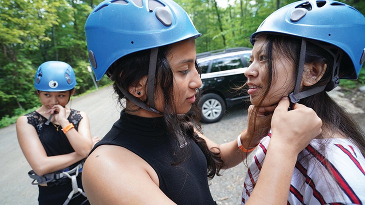 Girls prepare to climb