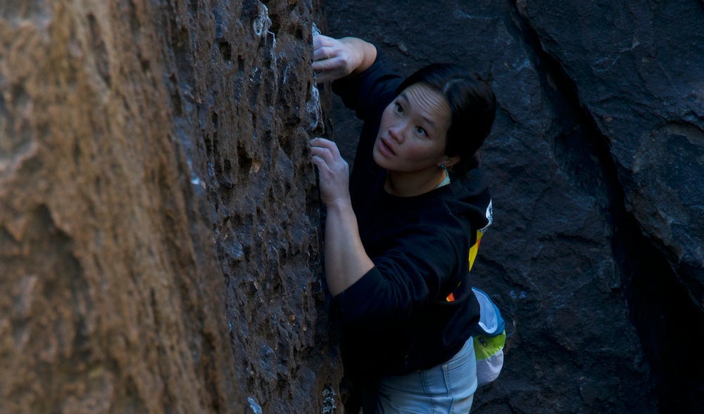 Woman rock climbing