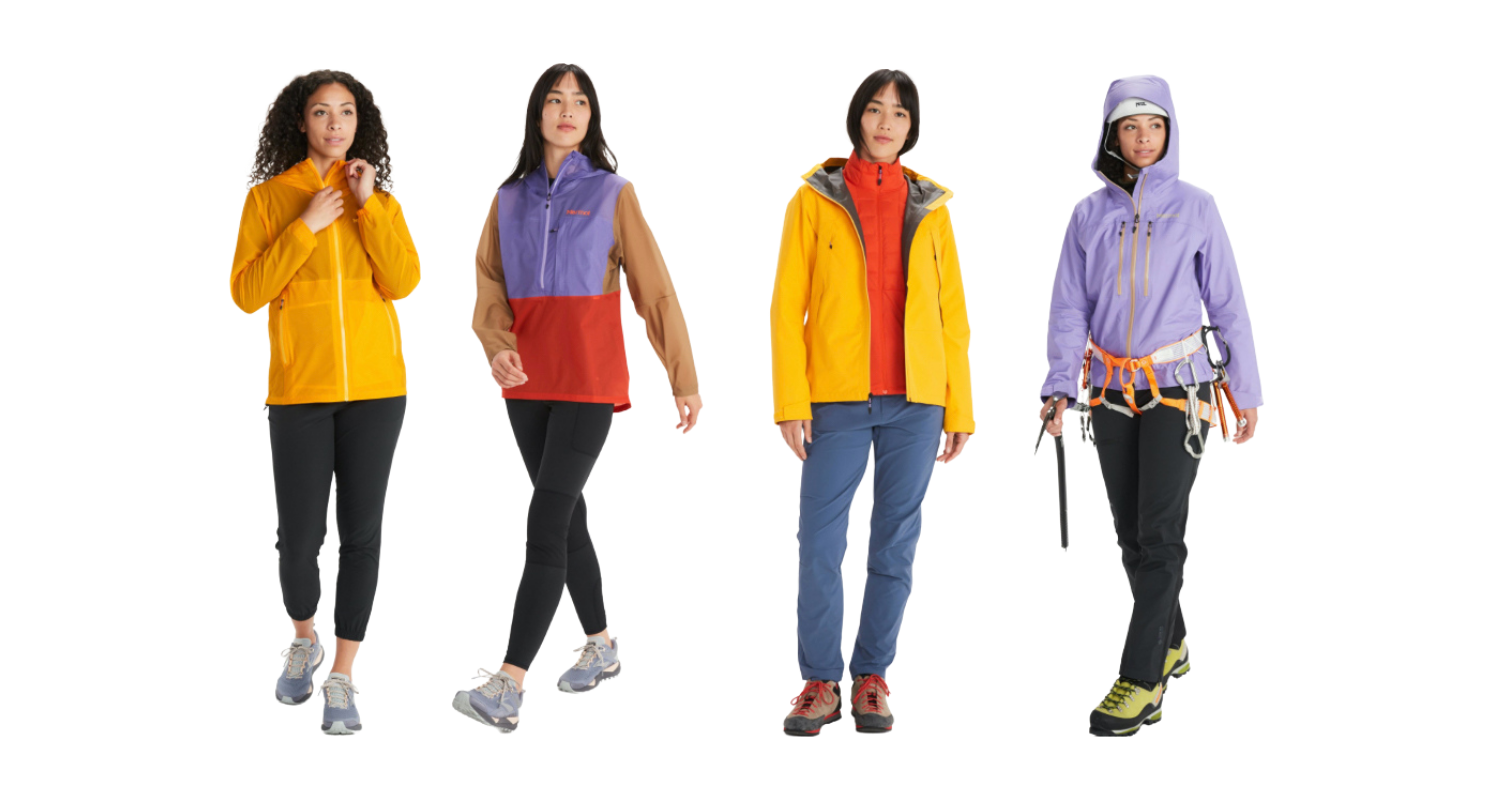 Four women wearing Marmot gear