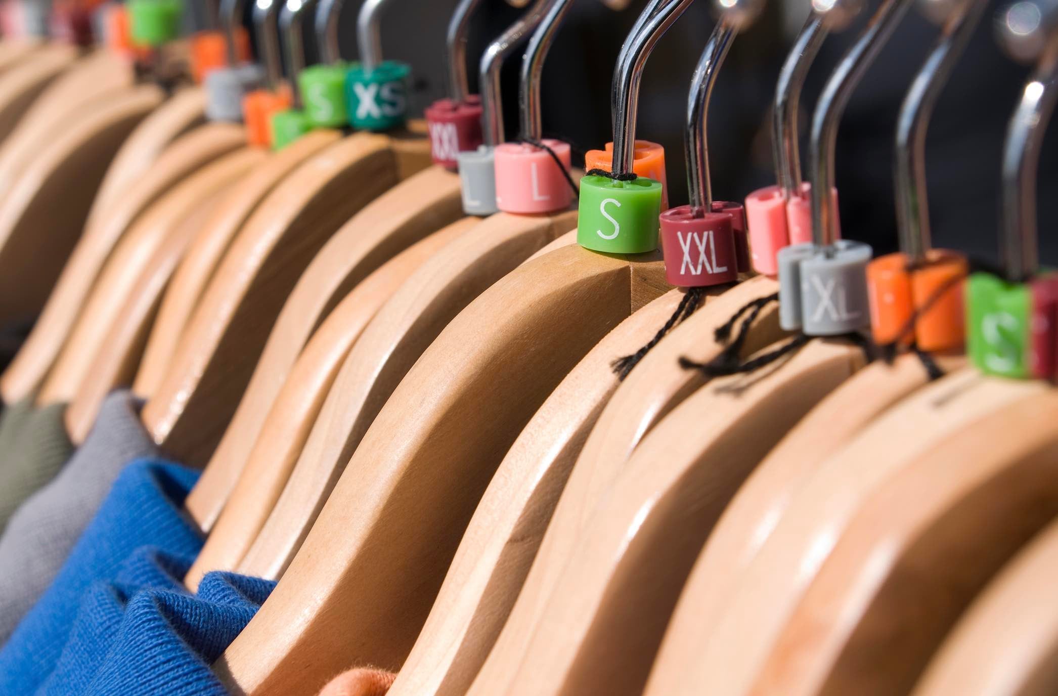 Clothing hangars with sizing tags