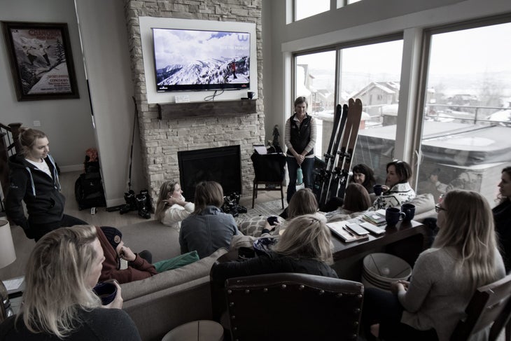 BT18_W2W_ParkCityFocus Women gathered at a house looking at skiing photo