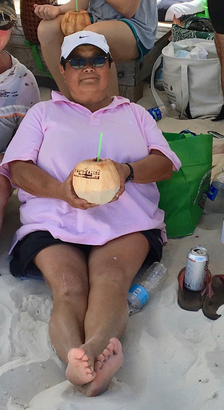 Carol Momoda coconut Carol Momoda holds a coconut