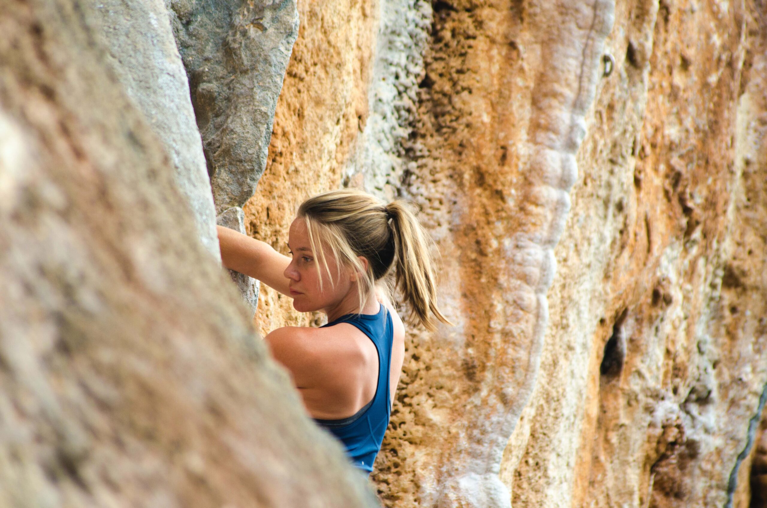 Woman rock climbing