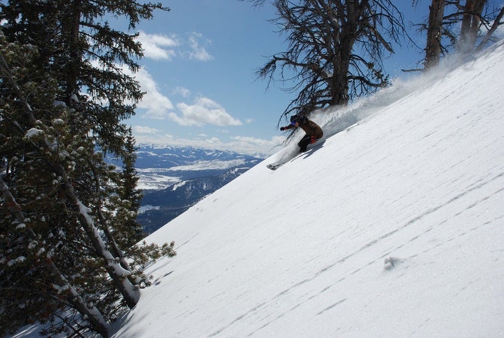 jackson hole skier_unsplash via max kramer Skier on powder at Jackson Hole