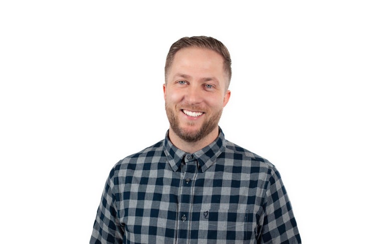 NickStagge-headshot Nick Stagge of ExpertVoice is smiling on a white background. He is a white man in a blue-gray checkered button down shirt.