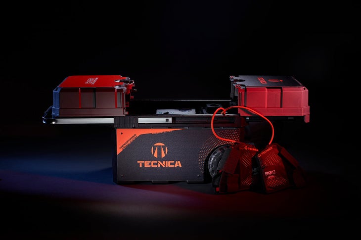 Tecnica CAS trolley Tecnica custom adapted shape machine sits on a black background.