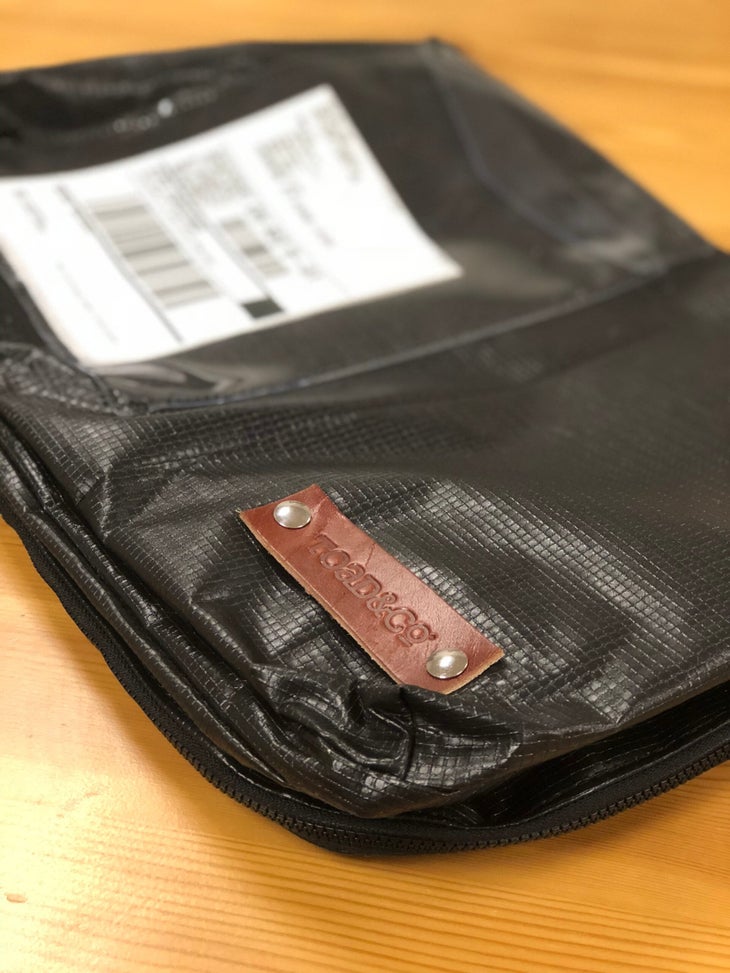 TOAD LOGO lime loop shipper Black LimeLoop shipping bag with label and Toad&Co leather label is a new solution in sustainable packaging.