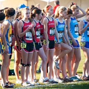 women cross country runners on start line looking nervous