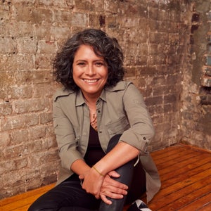 Woman sitting on floor