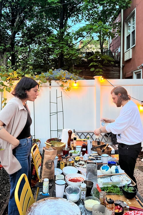 Gathering in Ogbonna’s backyard for a barbecue