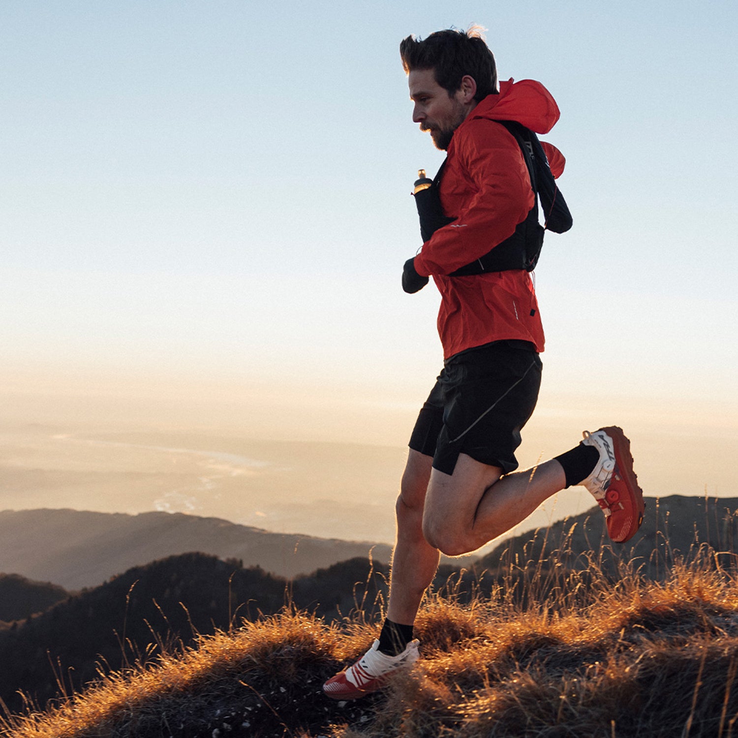 Person running at golden hour.