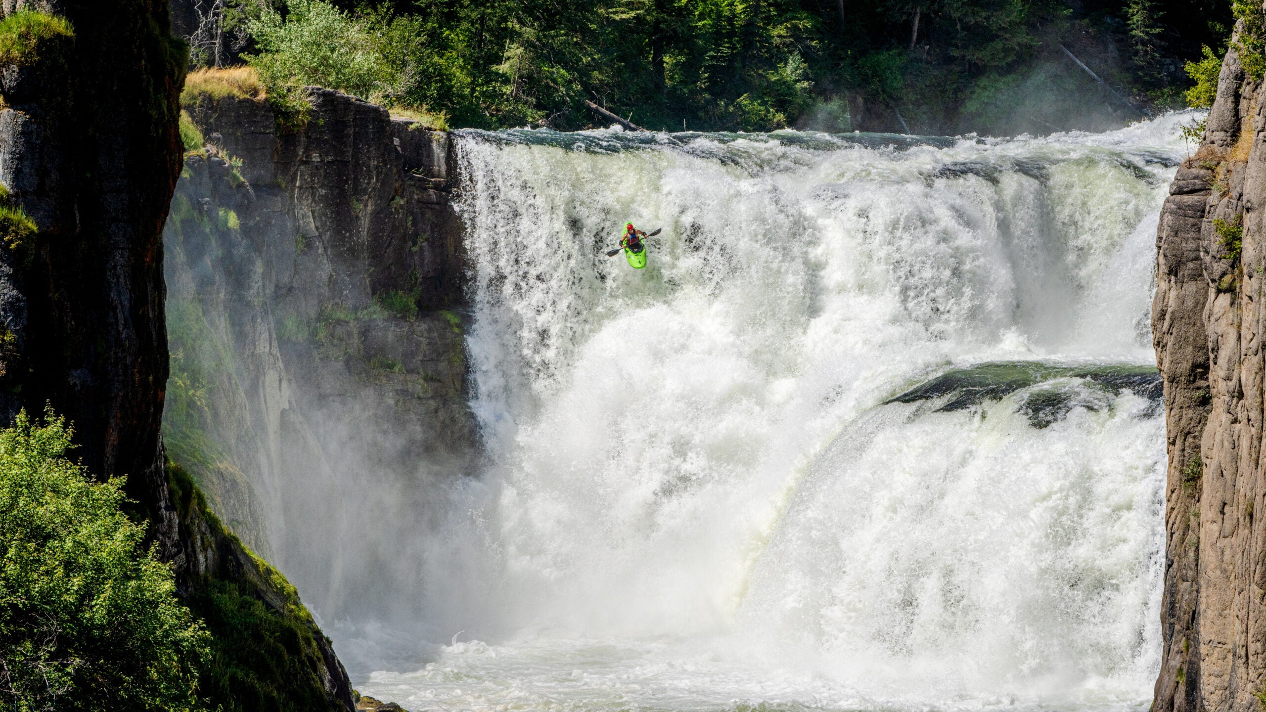 A kayaker goes off a huge cliff