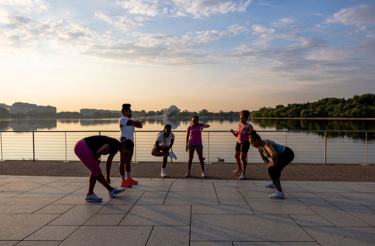 women stretching for a morning run