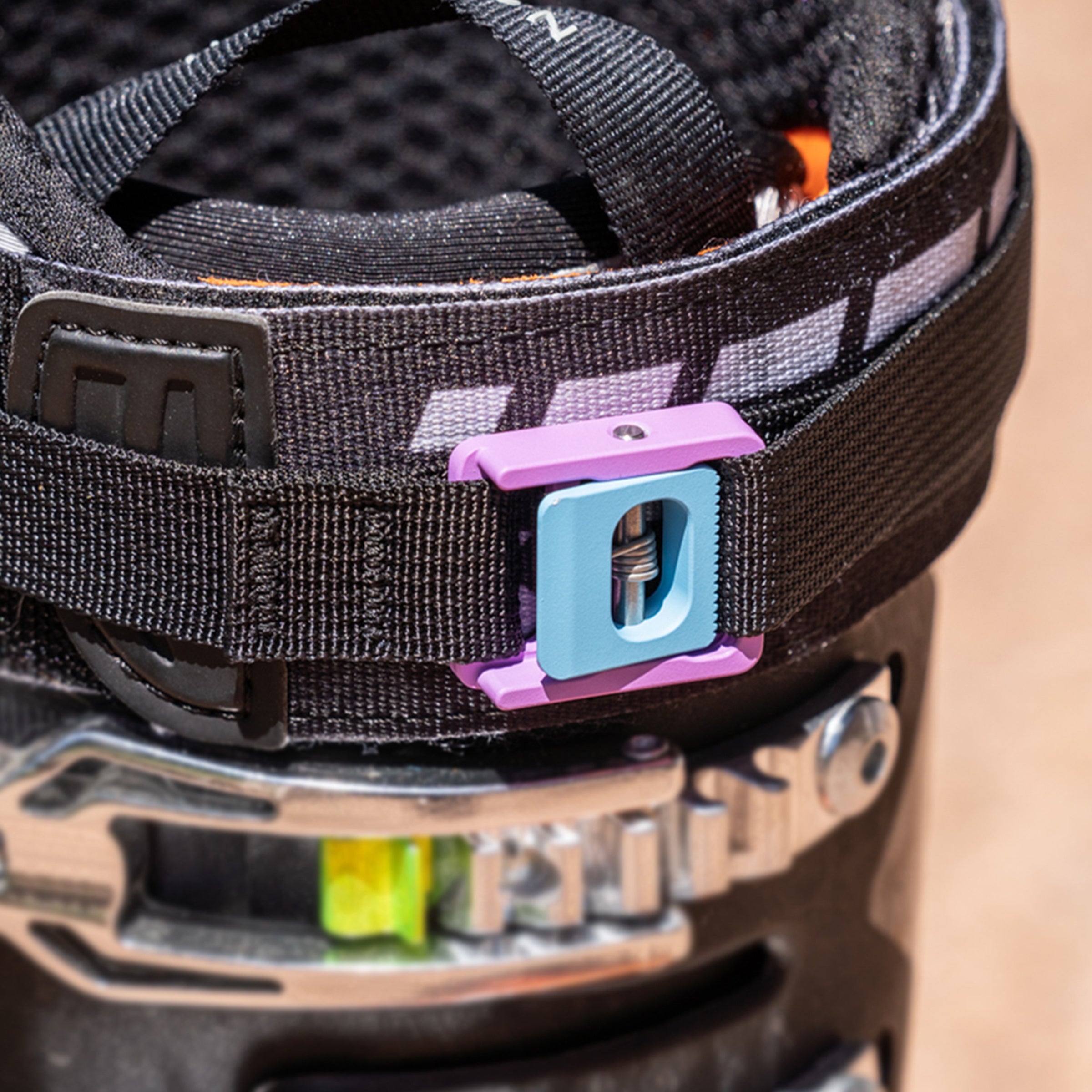 Austere strap on ski boot
