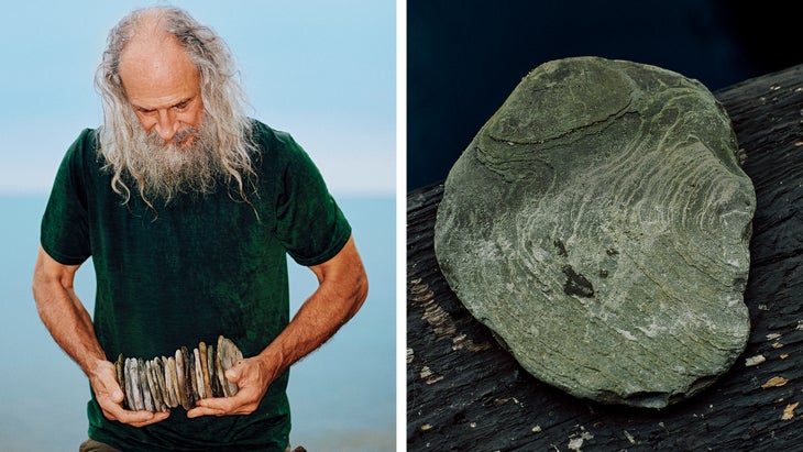 Kurt Steiner with stones he collected on the shore of Lake Erie