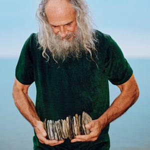 Kurt Steiner with stones he collected on the shore of Lake Erie