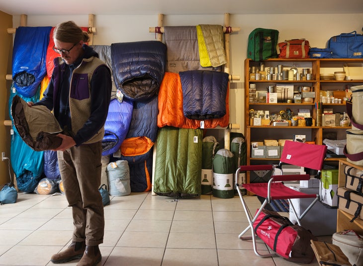 Thayne Nord looking at camping gear in the Tourist gear shop