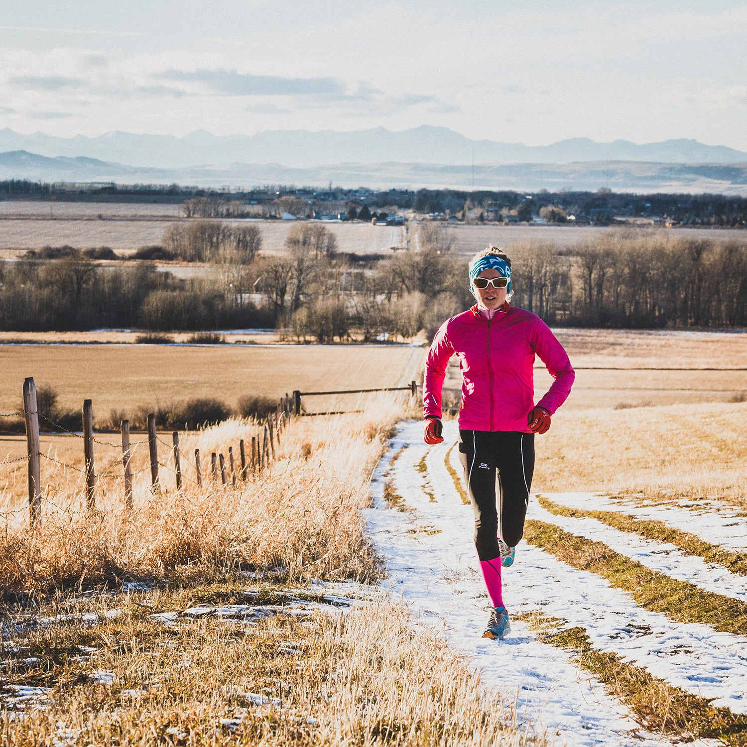 Winter runner on a trail