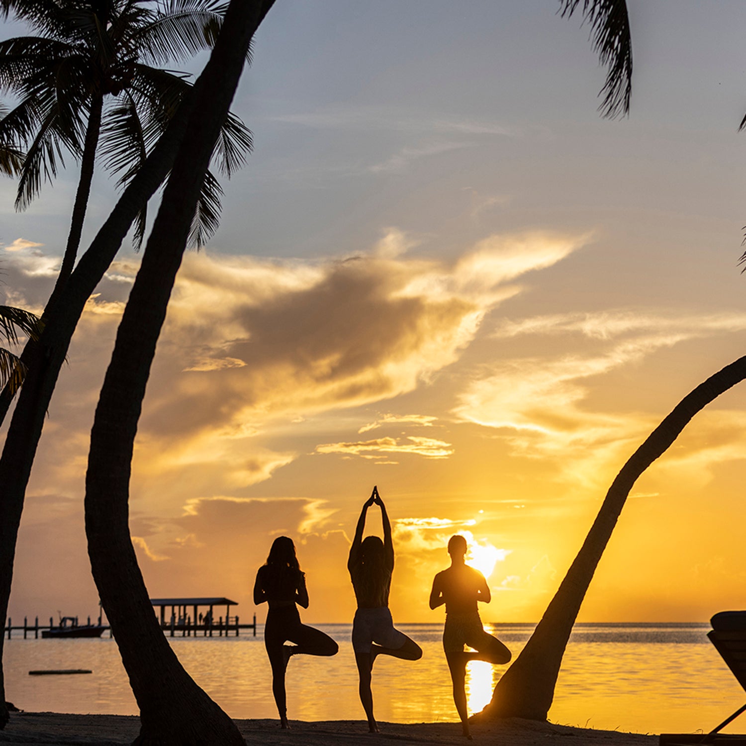 Three People Doing Yoga in the Florida Keys