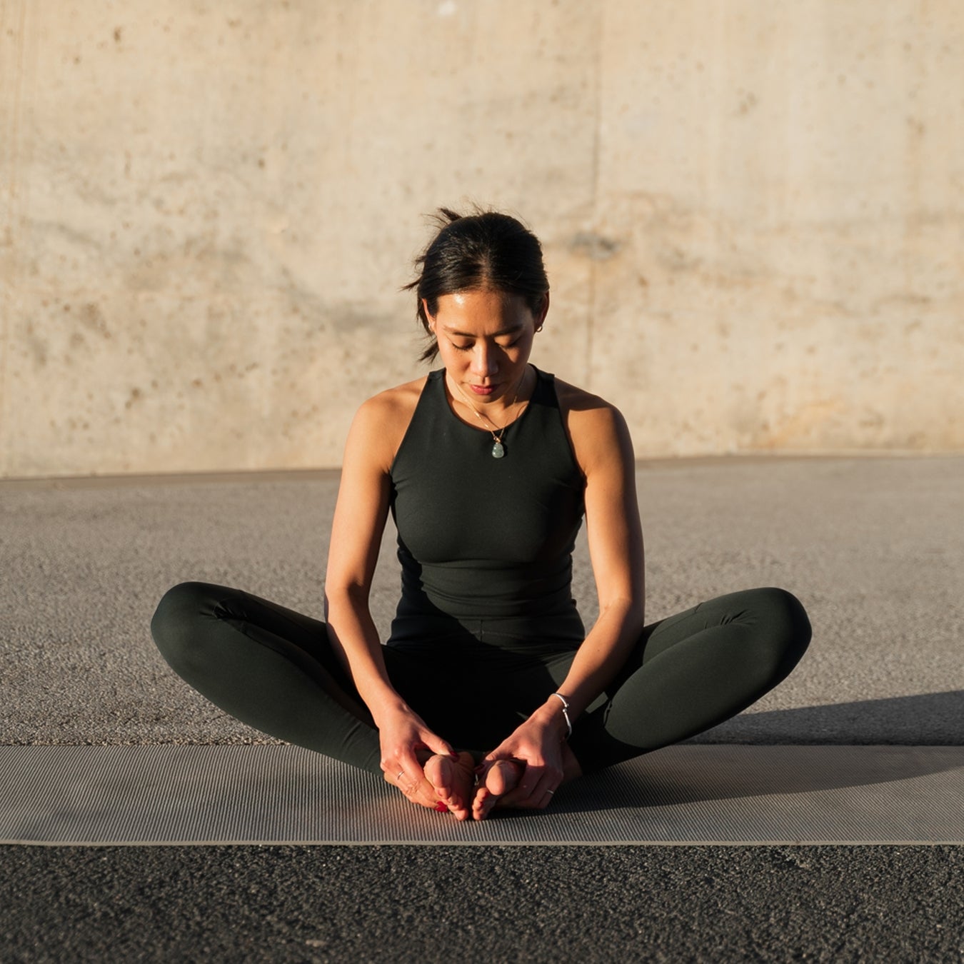 Woman Practices Butterfly Yoga Pose