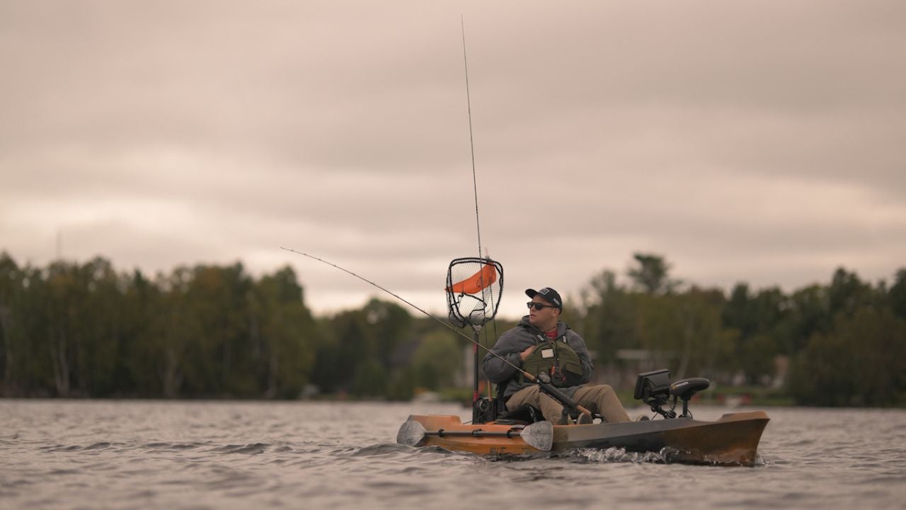 a man fishing from a boat