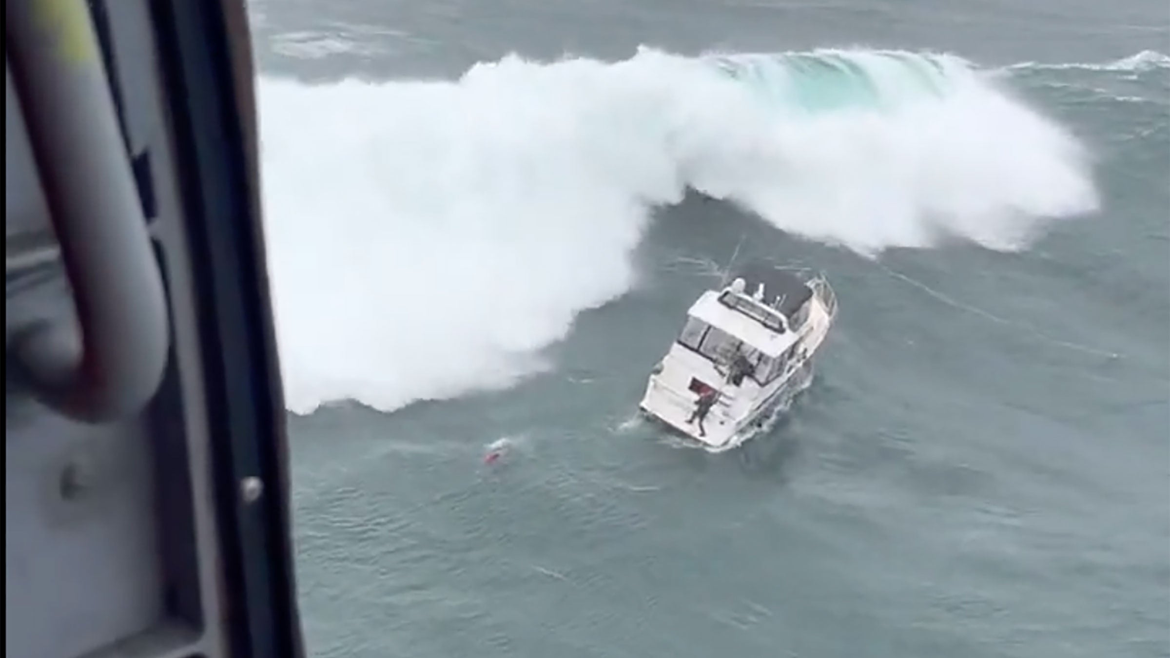 The stricken boat was pummeled by waves. 