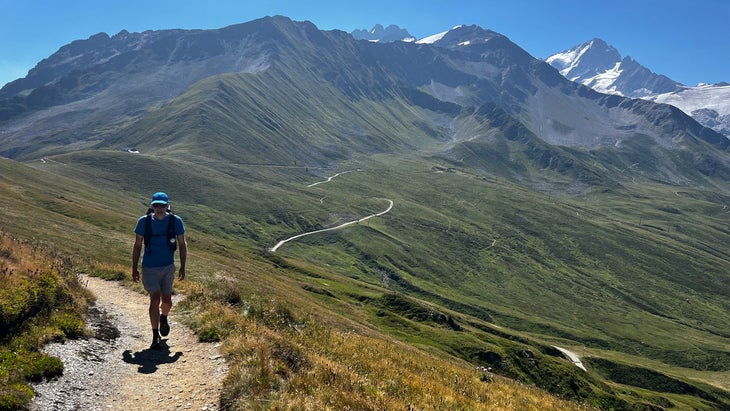 man hiking alps