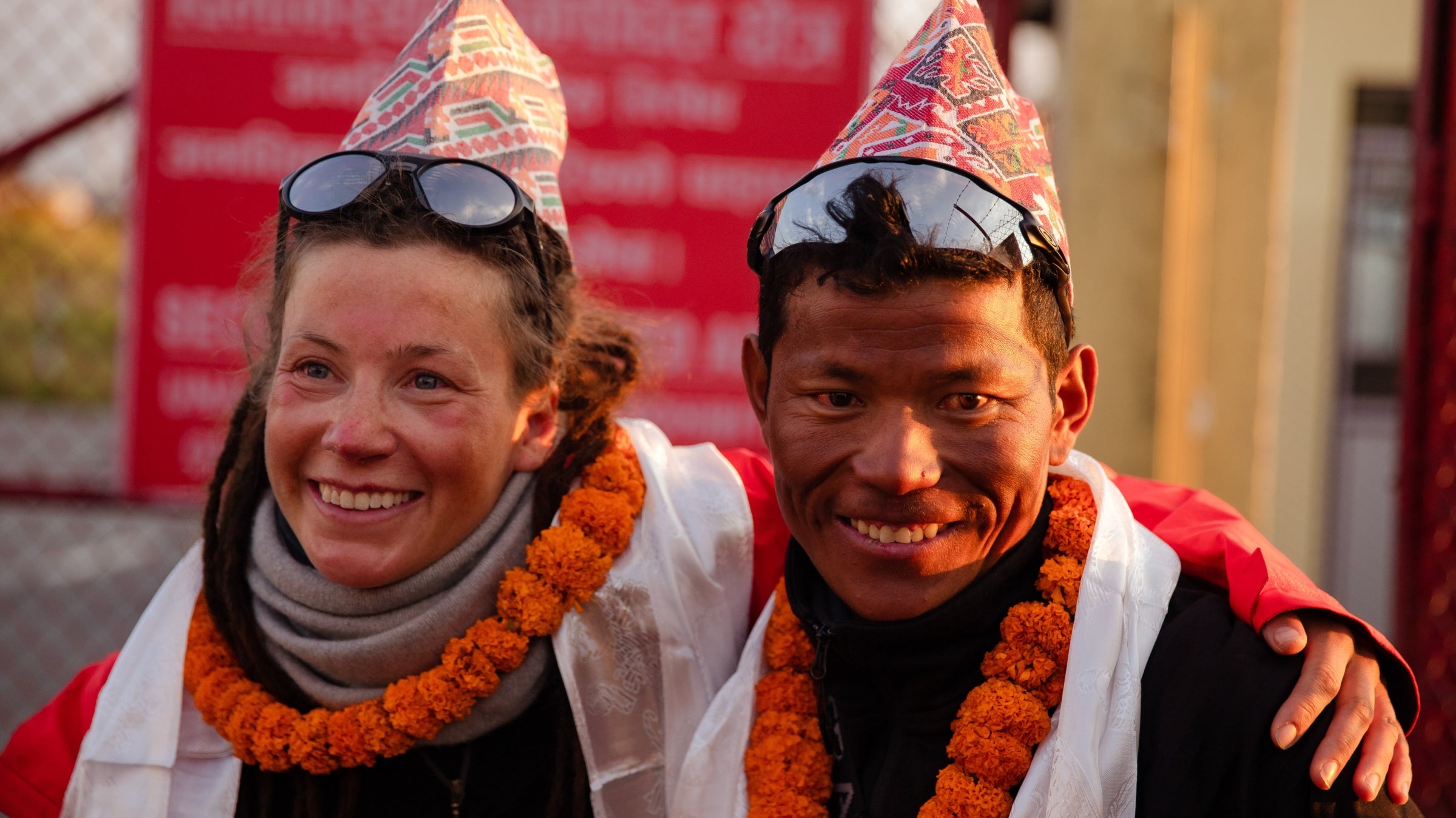 Kristin Harila and Tenjin Sherpa pose for a photo in Kathmandu after reaching the summit of Cho Oyu on May 3