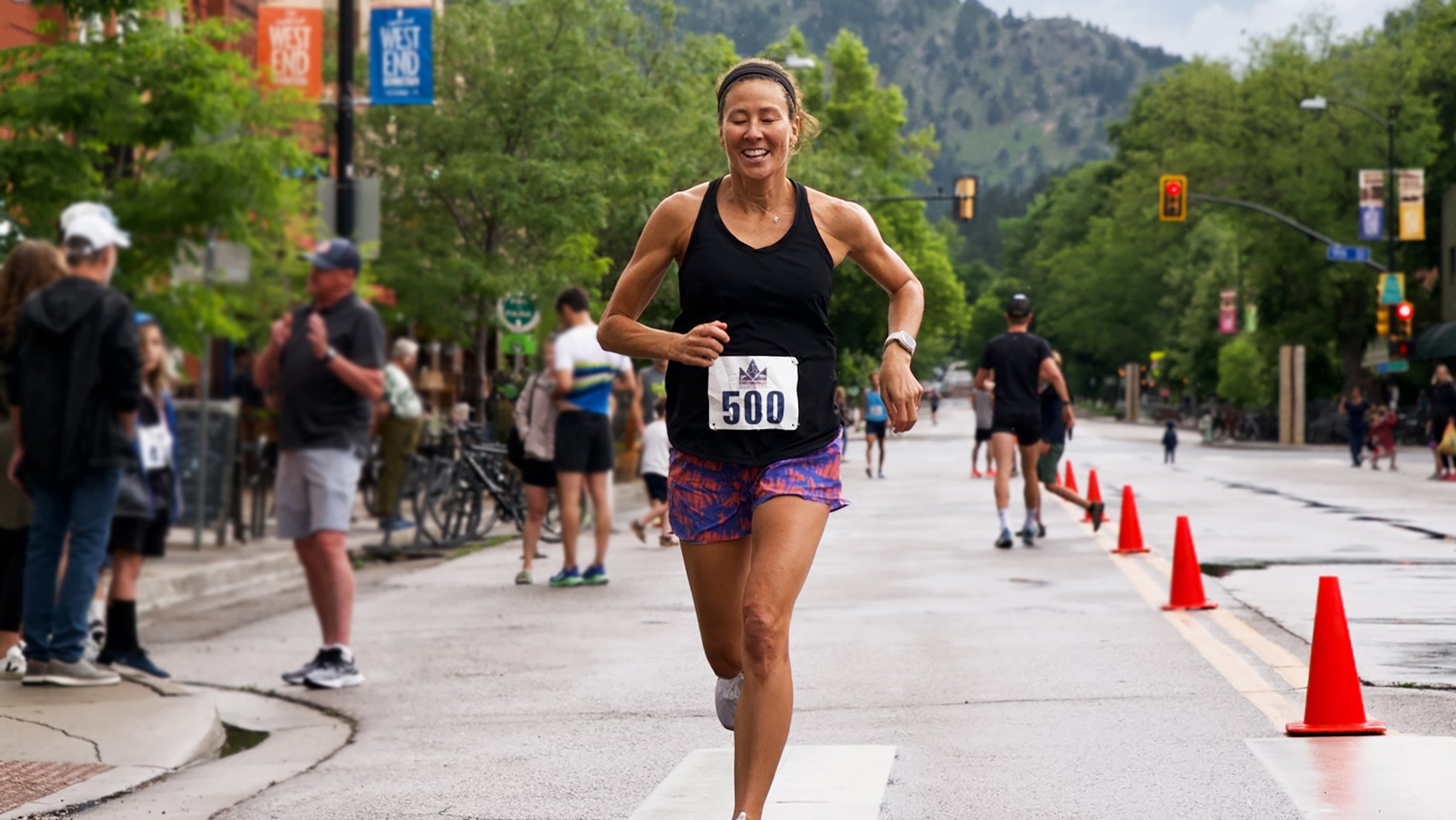 Lisa Jhung running in a summer race in Boulder, CO
