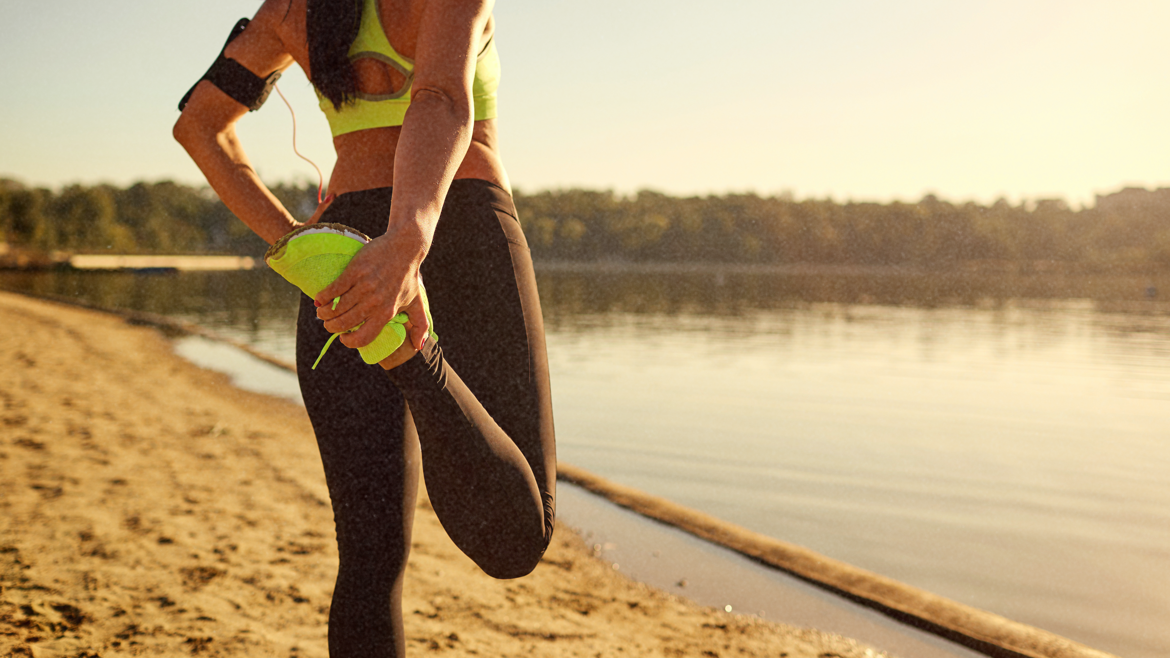 woman-stretching-outside-stopping in middle of run
