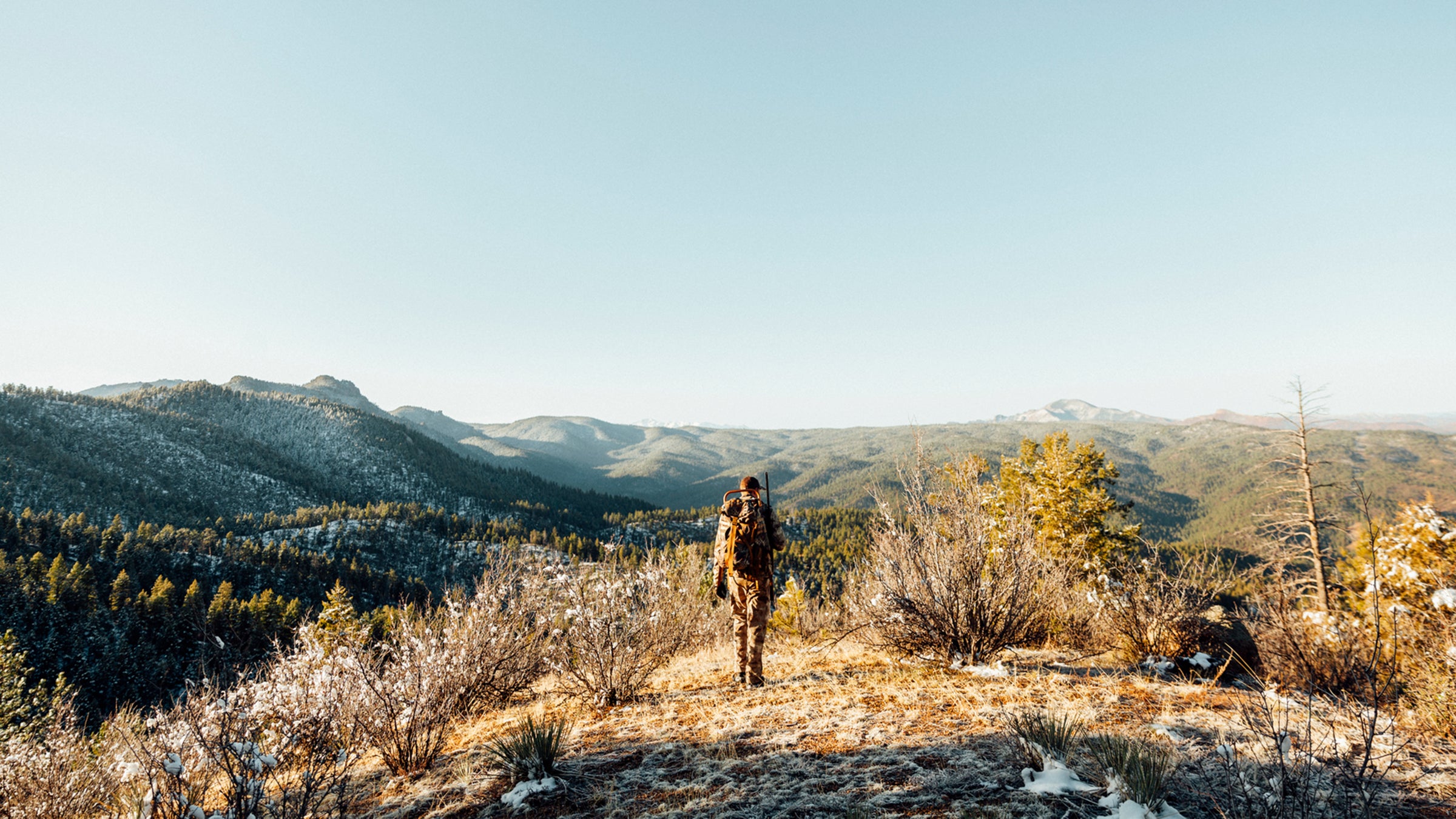 A man in the early morning out in Colorado on a turkey hunt