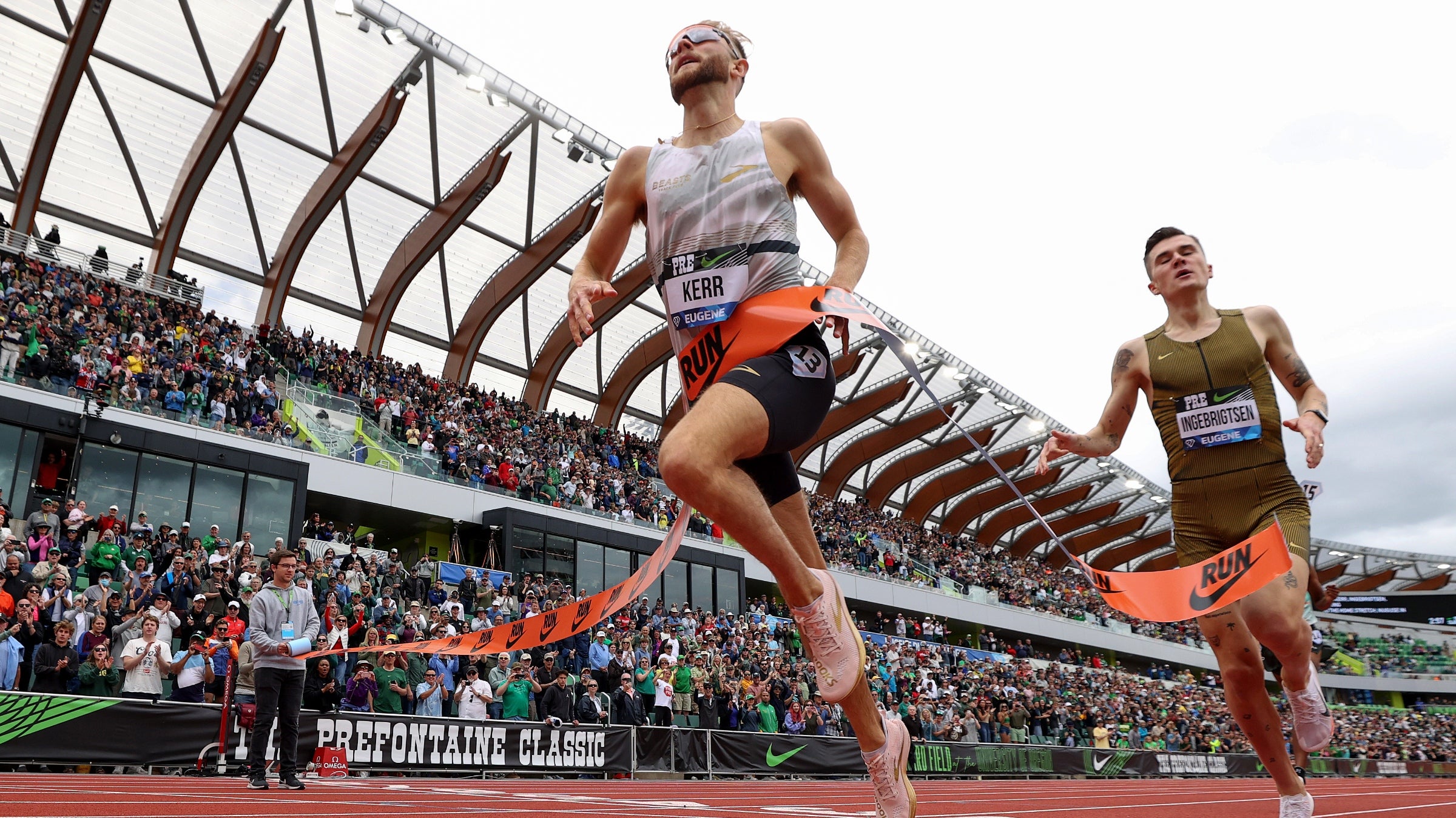 Scotland's Josh Kerr and Norway's Jakob Ingebrigsten cross the finish at the 2004 Prefontaine Classic