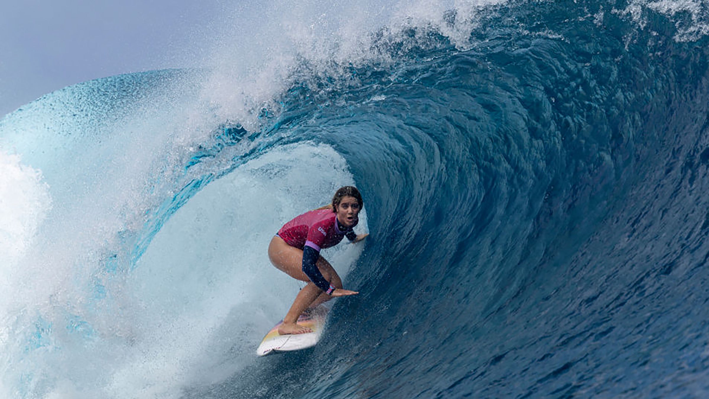 Caroline Marks surfs in the Olympic finals.