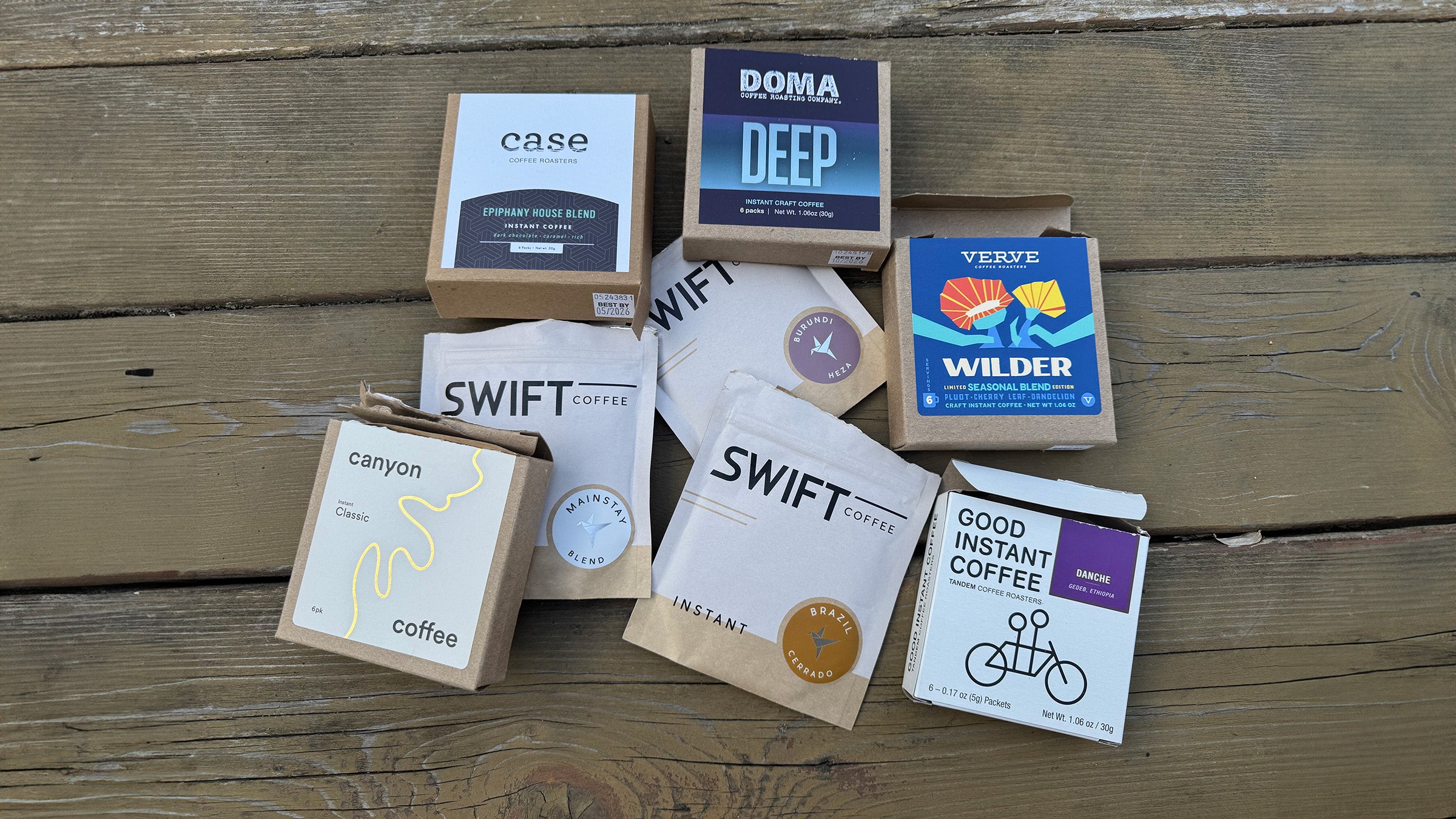 Closeup of instant coffee packs on picnic table