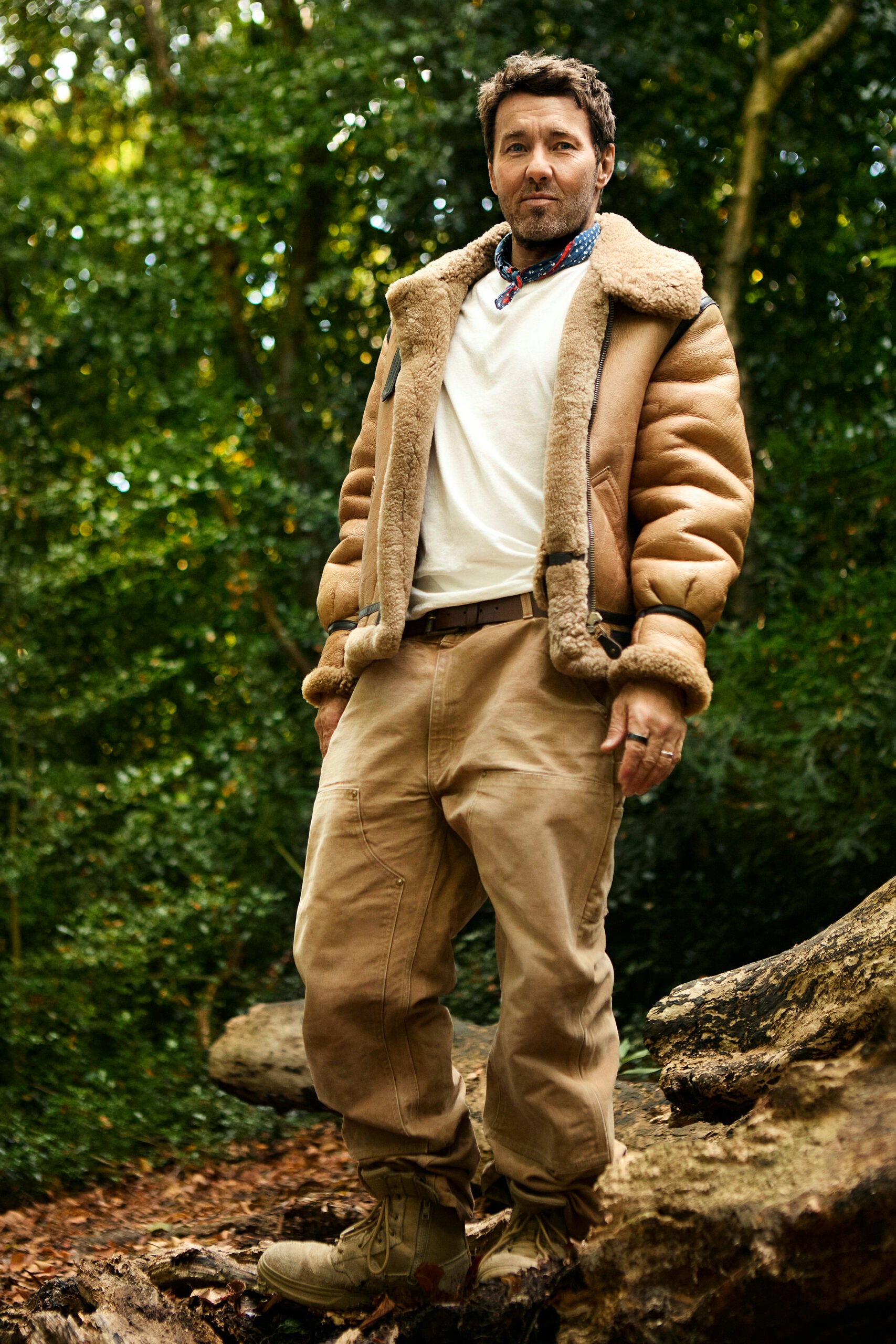 White T-shirt from Merz B. Schwanen at Clutch Cafe London; vintage Air Force jacket, Carhartt pants, neck scarf, and vintage boots, his own.