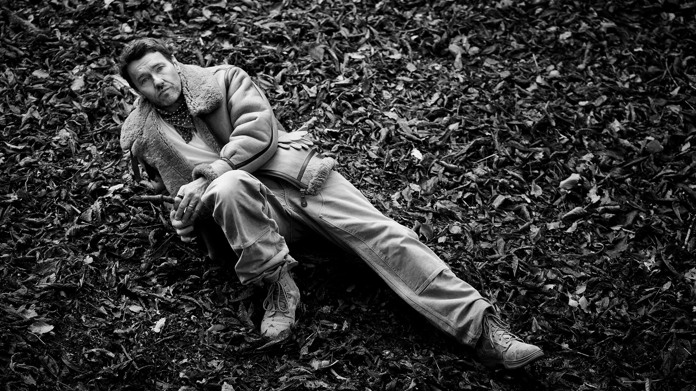 Joel wears a T-shirt by Merz B. Schwanen from Clutch Cafe London; vintage Air Force Jacket, Carhartt pants, neck scarf, and vintage boots, his own.