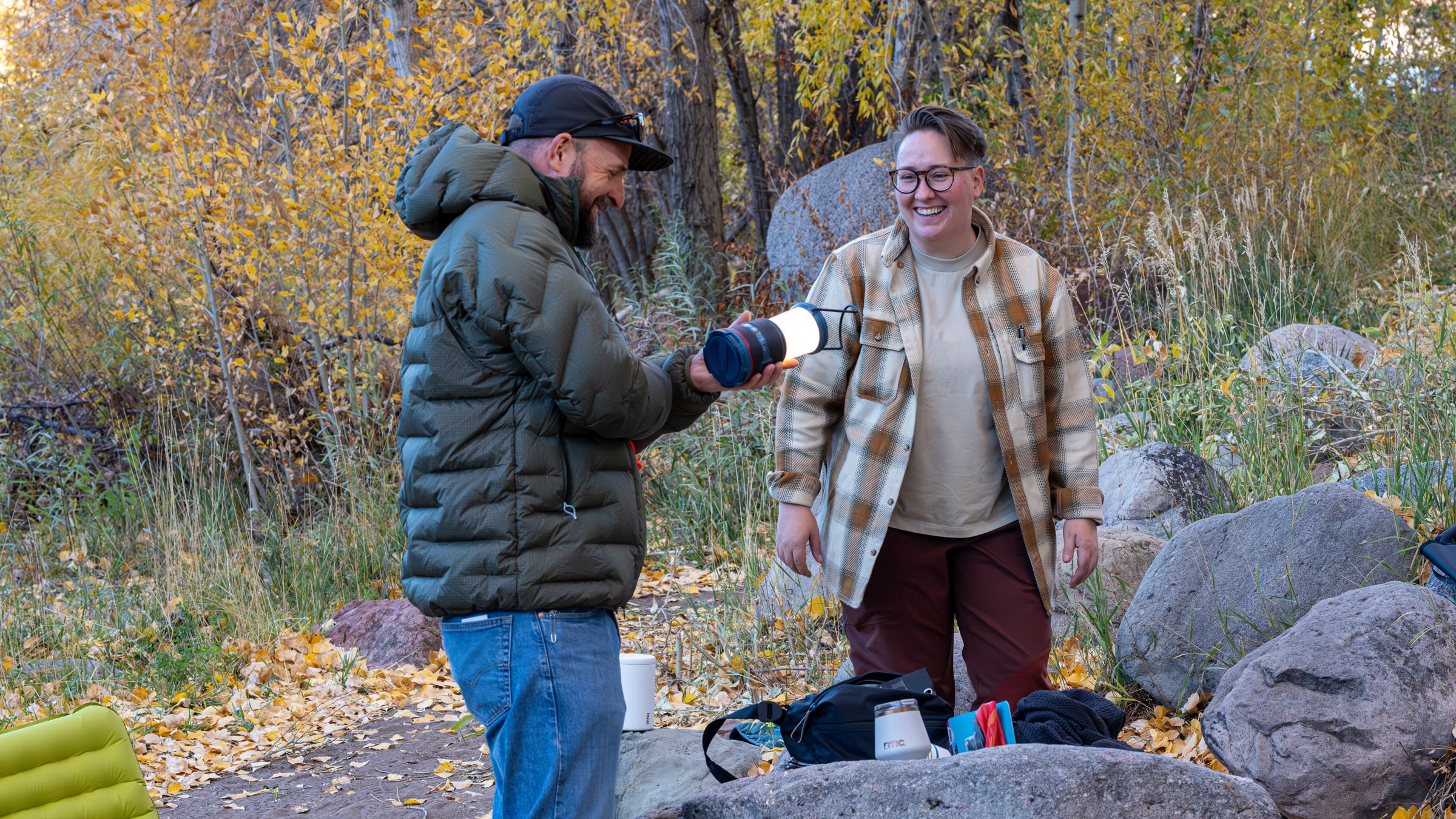 Jakob and Erica reviewing gear at Outdoor Media Summit