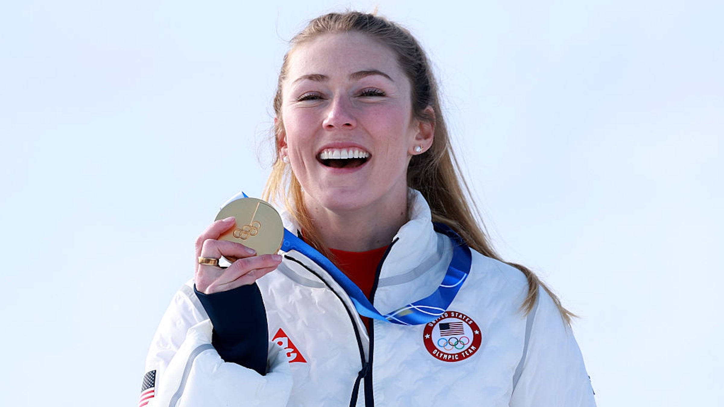 Gold medalist Mikaela Shiffrin of Team United States celebrates on the podium during the medal ceremony following the Women's Slalom Run on day twelve of the Milano Cortina 2026 Winter Olympics at Tofane Alpine Skiing Centre on February 18, 2026 in Cortina d'Ampezzo, Italy.