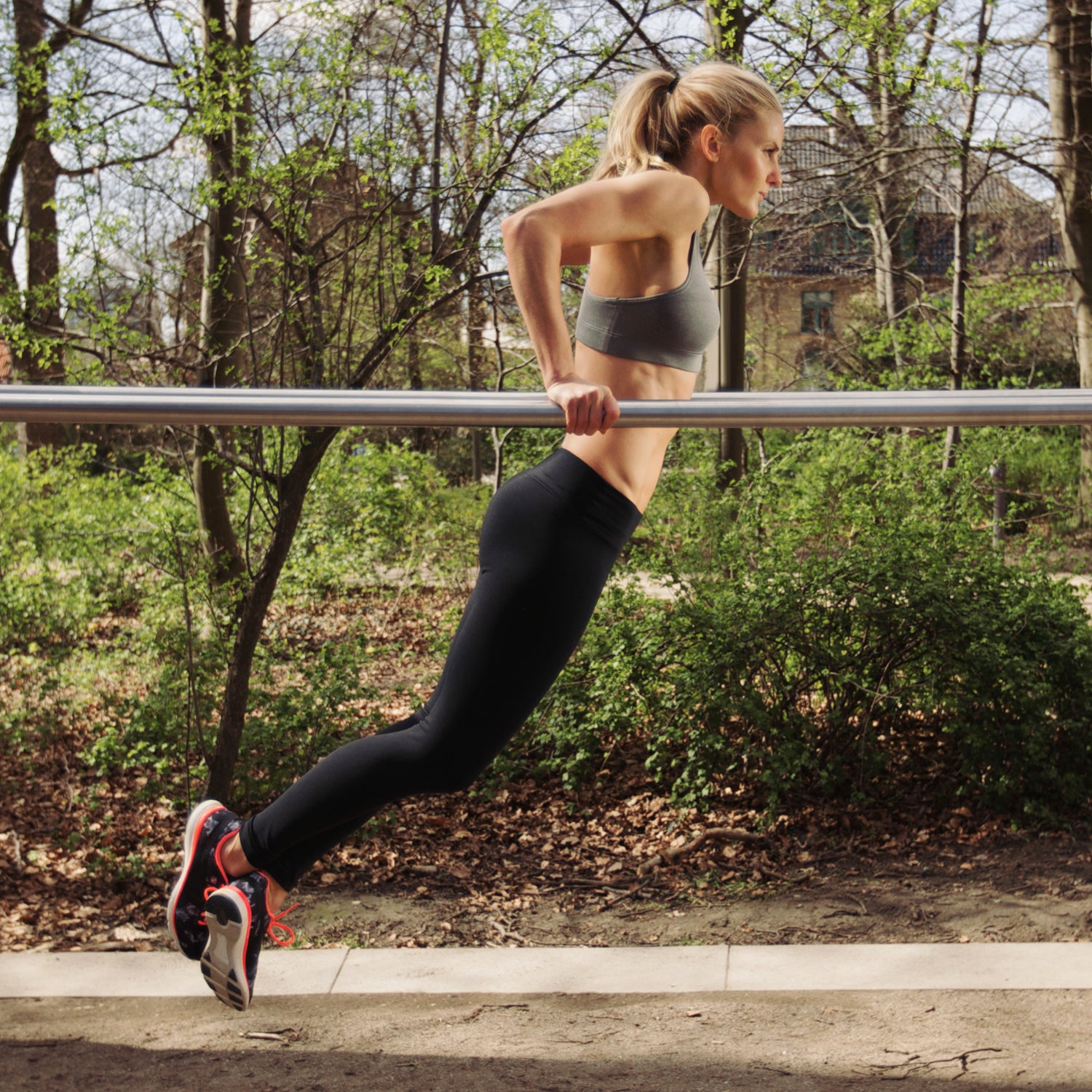 25-30 years adult athlete balance beauty and health caucasian concentration crossfit day dips endurance energy exercise exercising female fit fitness flexibility gymnastics healthy lifestyle lifestyle muscular build nature one person outdoors parallel bars park people power practicing side view sport sports clothing sports equipment sports training station strength strong training triceps triceps dips wellbeing women workout young young women