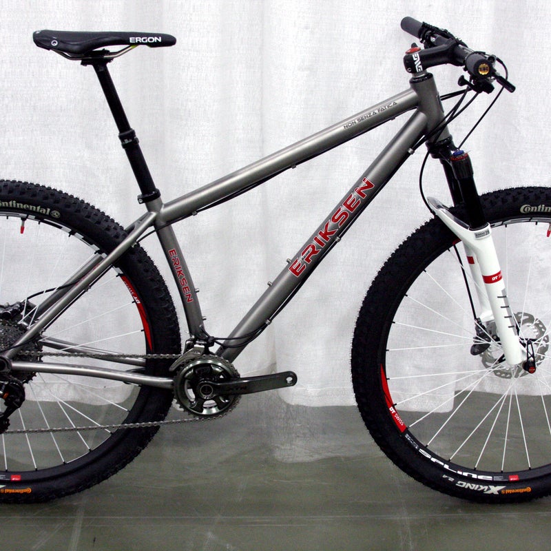 At less than 22 pounds, Kent Eriksen Cycles' 29er titanium hardtail is built for speed. Welder and elite racer Brad Bingham was touring Italy with a friend in 2009, they discovered a crumbling 1,200 year old school with “non senza fatica” chiseled into the stone. Translation: "Nothing without effort," a fitting motto for Bingham, who etched it onto the top tube.