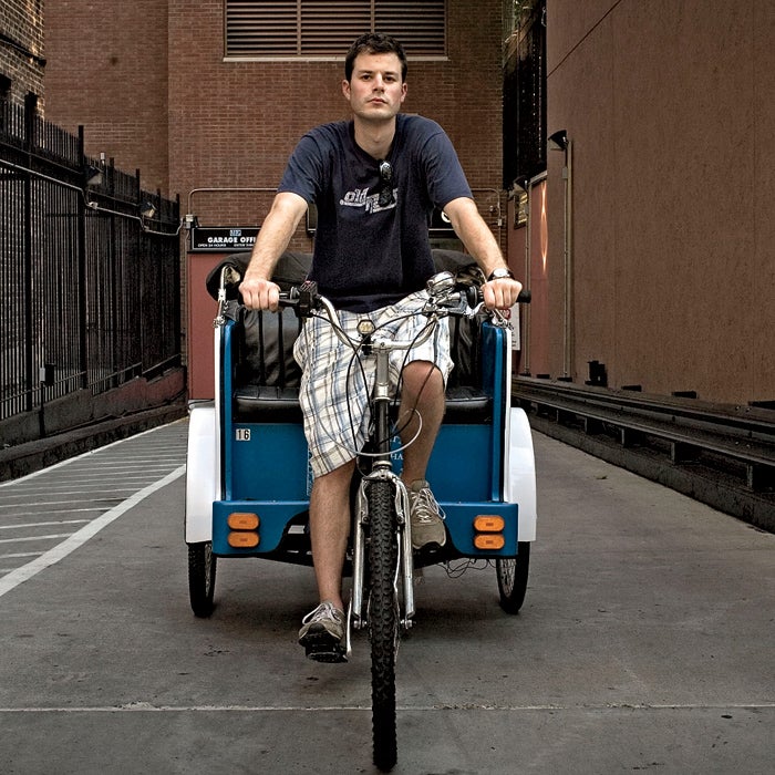 1 person bicicletta bicycle capitale capital citta' city colore color figura intera full length figur giovani gioventu' youth lavoro work orizzontale horizontal pedalare pedaling andare in bic ragazzo boy ritratto portrait taxi cab trasporti transportation trasporto via terra ground tran pedicab driver job how to