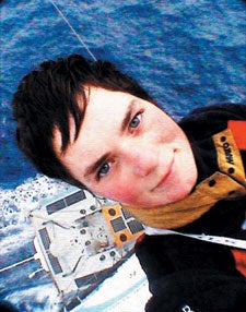 High-wire act: A video camera attached to the mast captured this image of MacArthur dangling above Kingfisher and the Southern Ocean during the 2000-2001 Vendé Globe.