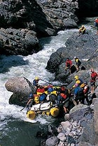 Portaging a Class V rapid