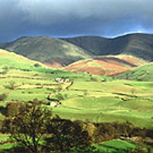The road less pedaled: storm clouds approaching in the English countryside
