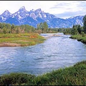 A grand day for a paddle: Snake River with the Tetons looming in the background