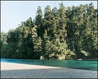 Spare those trees: second-growth forests line the far bank of the Big River.